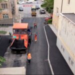 Strada Concordiei a scăpat de piatra cubică: se toarnă al doilea strat de asfalt